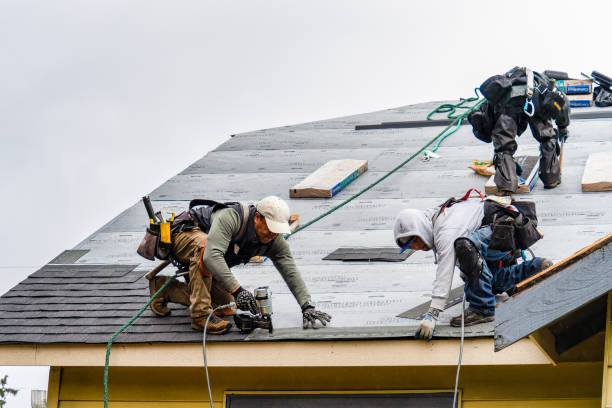 Professional Gutter Installation technician working in Westley, CA